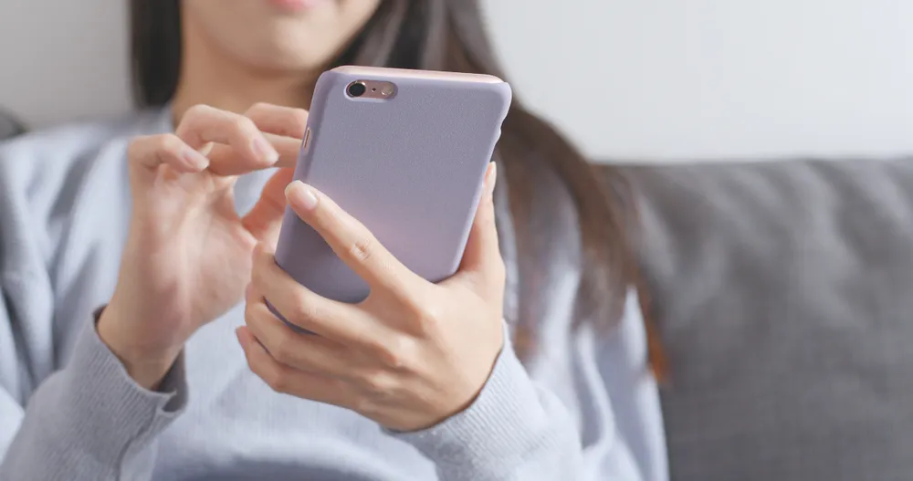 woman using smartphone