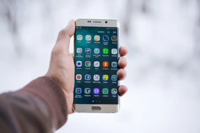 Hand holding an Android phone
