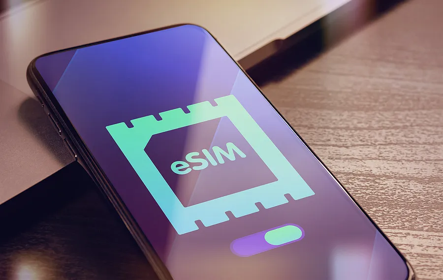 A smartphone displaying an eSIM icon on its screen
